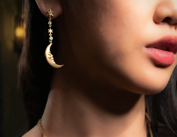 Anthony Lent Hanging Crescent Moonface Earrings on model