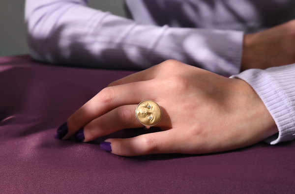 Anthony Lent Gold and Silver Moonface Ring on body 