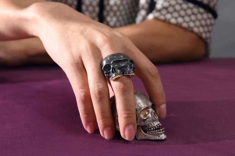 Anthony Lent Siamese Skull ring on body